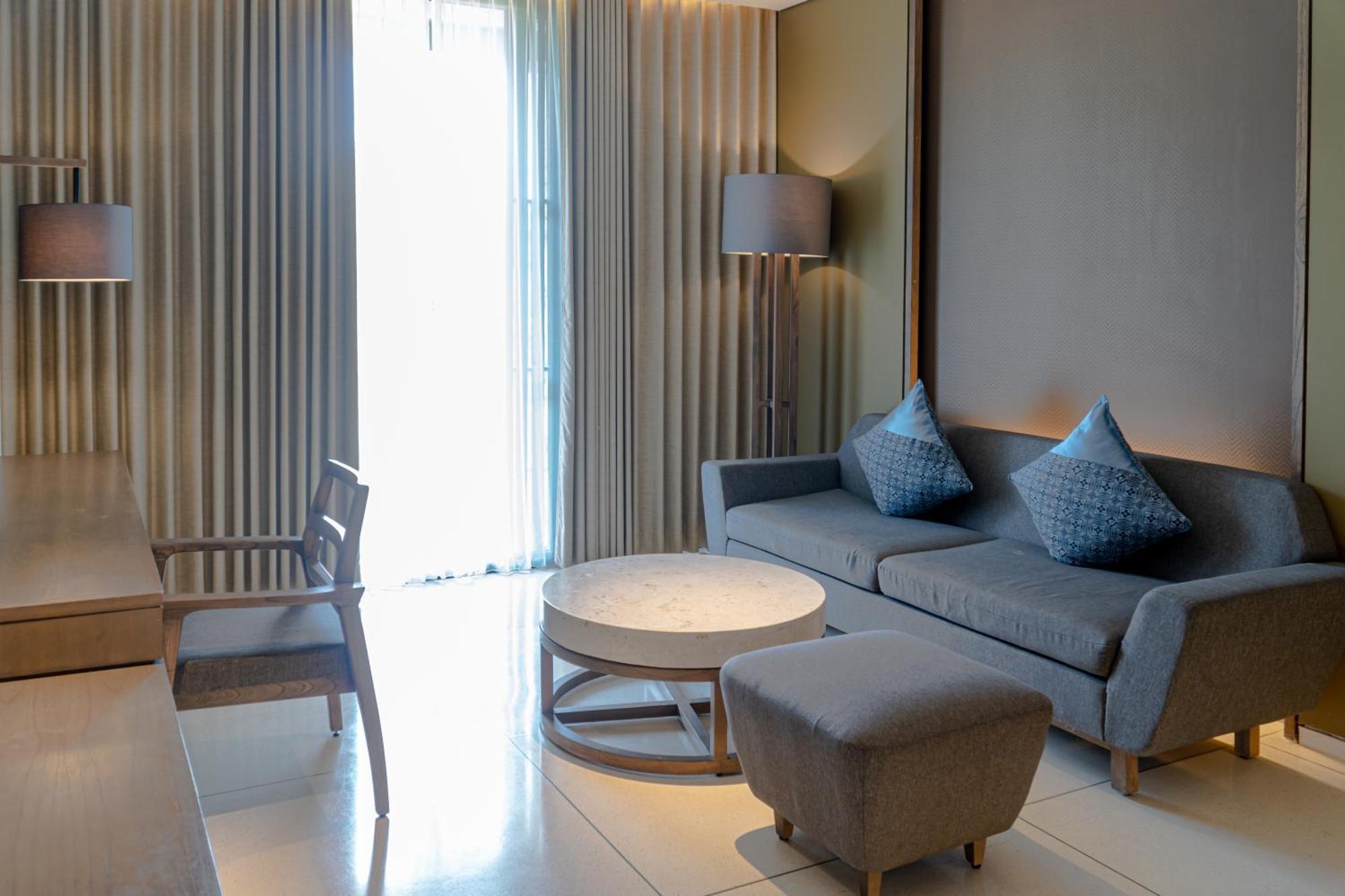 Wyndham Tamansari Jivva Resort Bali Siyut Esterno foto A living room at the hotel