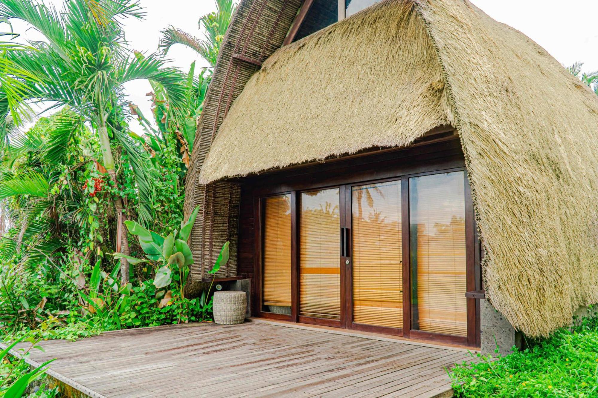 Wyndham Tamansari Jivva Resort Bali Siyut Esterno foto A villa at the resort